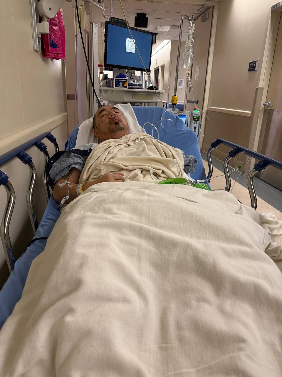 TJ Lee in a hospital bed after a concussion, earlier in 2026